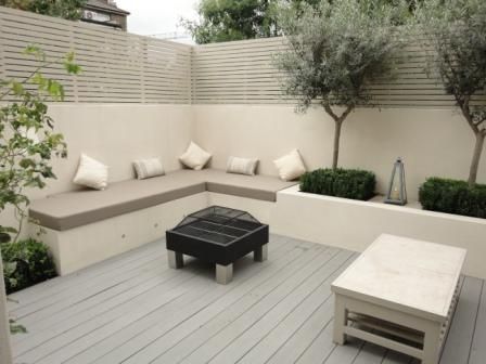 really like this clean, elegant but still cosy look for a garden seating area.