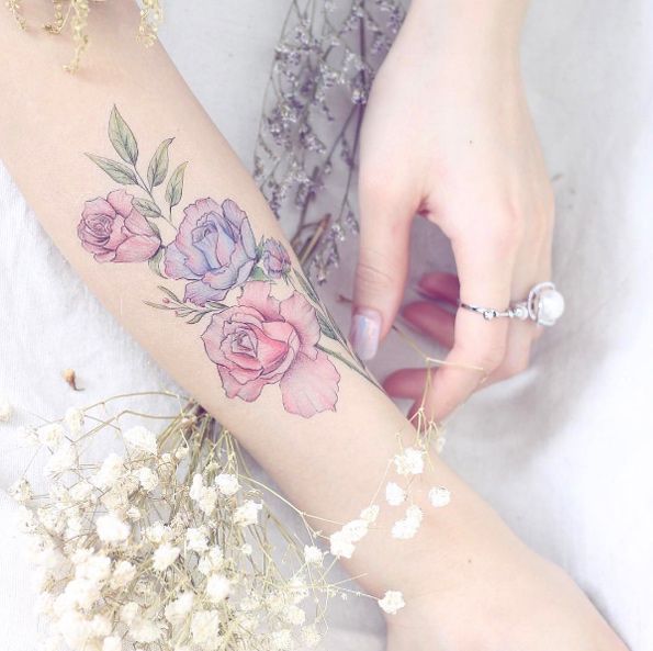 Roses on forearm by Mini Lau