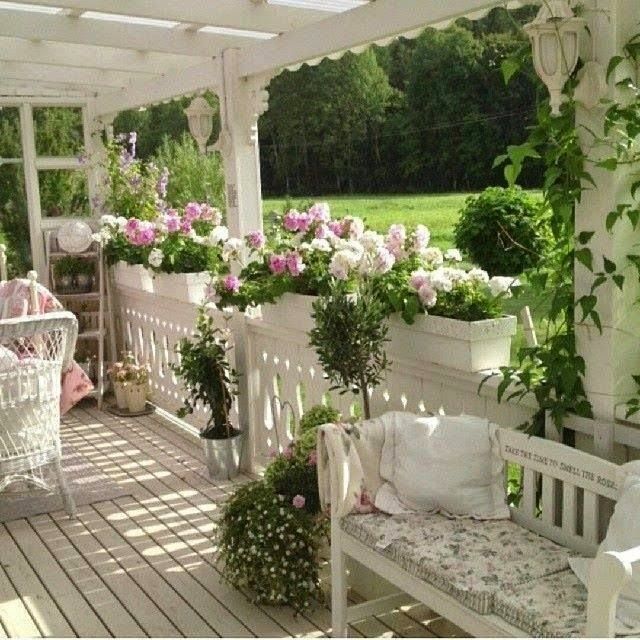 Shabby Chic front porch with beautiful flowers