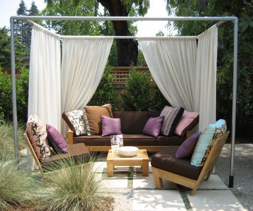 This simple and ingenious outdoor room (also designed by Whiteley) uses a frame of pvc pipe set into pvc sleeves pounded into the