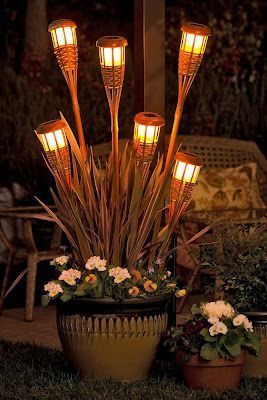 Use Dollar tree solar lights in tiki torch bases….. I love this idea for the deck. – interiors-designe…