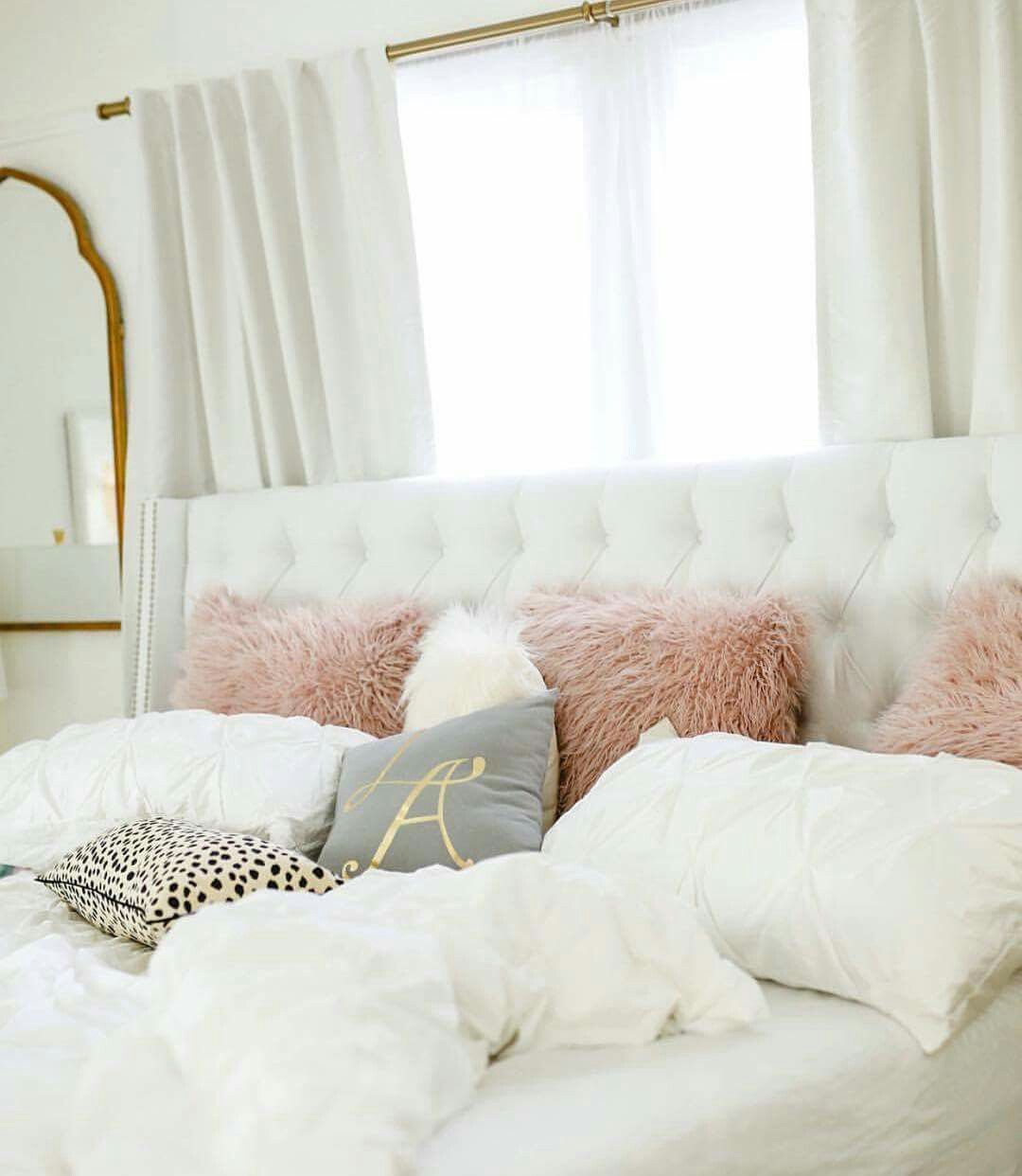 White, light grey, mauve, gold and animal print bedroom decor