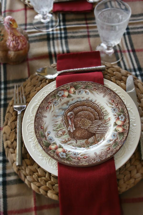 A variety of turkey plates look great with the colors in this plaid table scarf.  I just love the colors of fall!