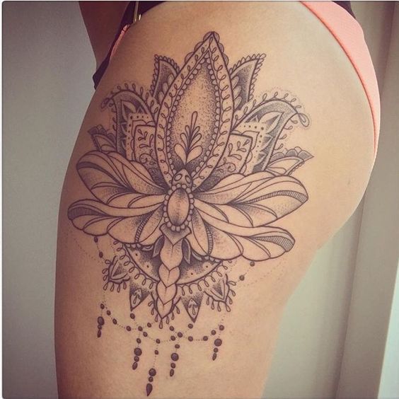 Beautiful lotus and dragonfly thigh piece done on instagram: Rebekah_Jonesy. Tattoo done by Instagram: Tommbirch