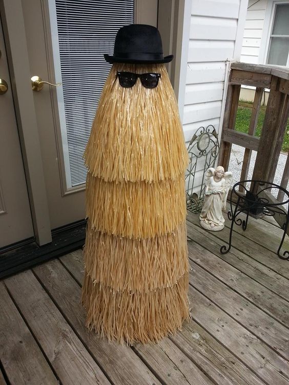 Cousin It – Tomato cage and grass skirts from the Dollar Store.:
