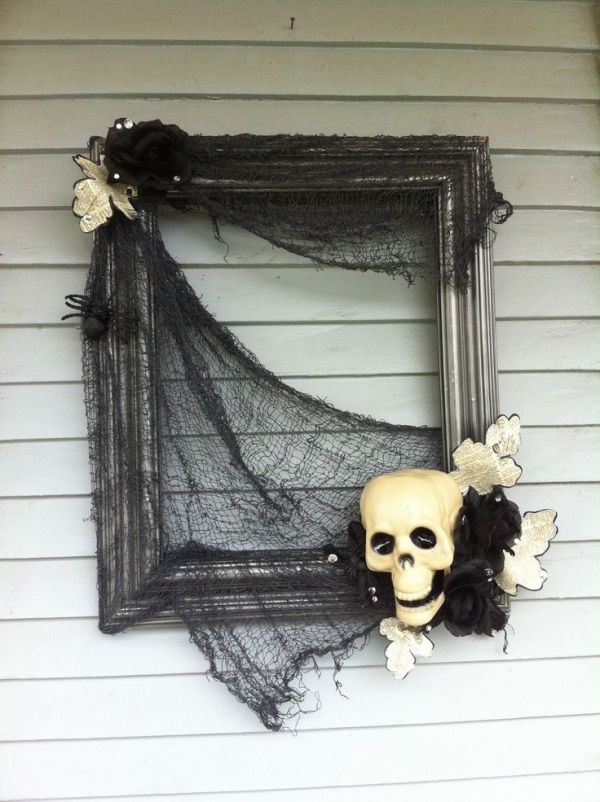 Halloween “wreath” I just made using and old frame and some dollar store decorations. by sillyme2