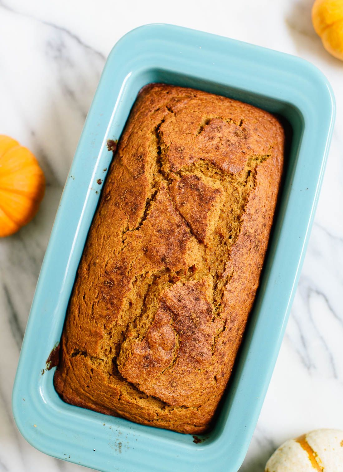 Healthy, naturally sweetened pumpkin bread made with coconut oil and whole wheat flour! It’s my favorite. cookieandkate.com