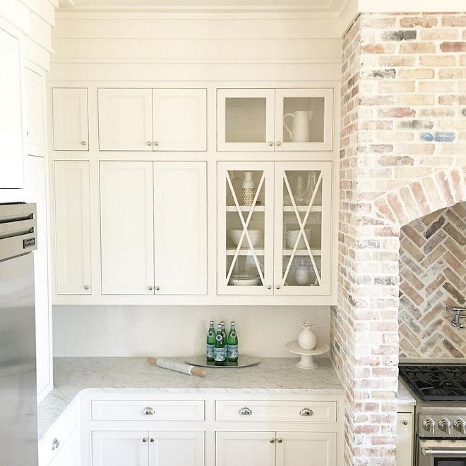 Kitchen cabinet paint color is “White Dove Benjamin Moore”. Kitchen brick accent is reclaimed Chicago Brick with a heavy