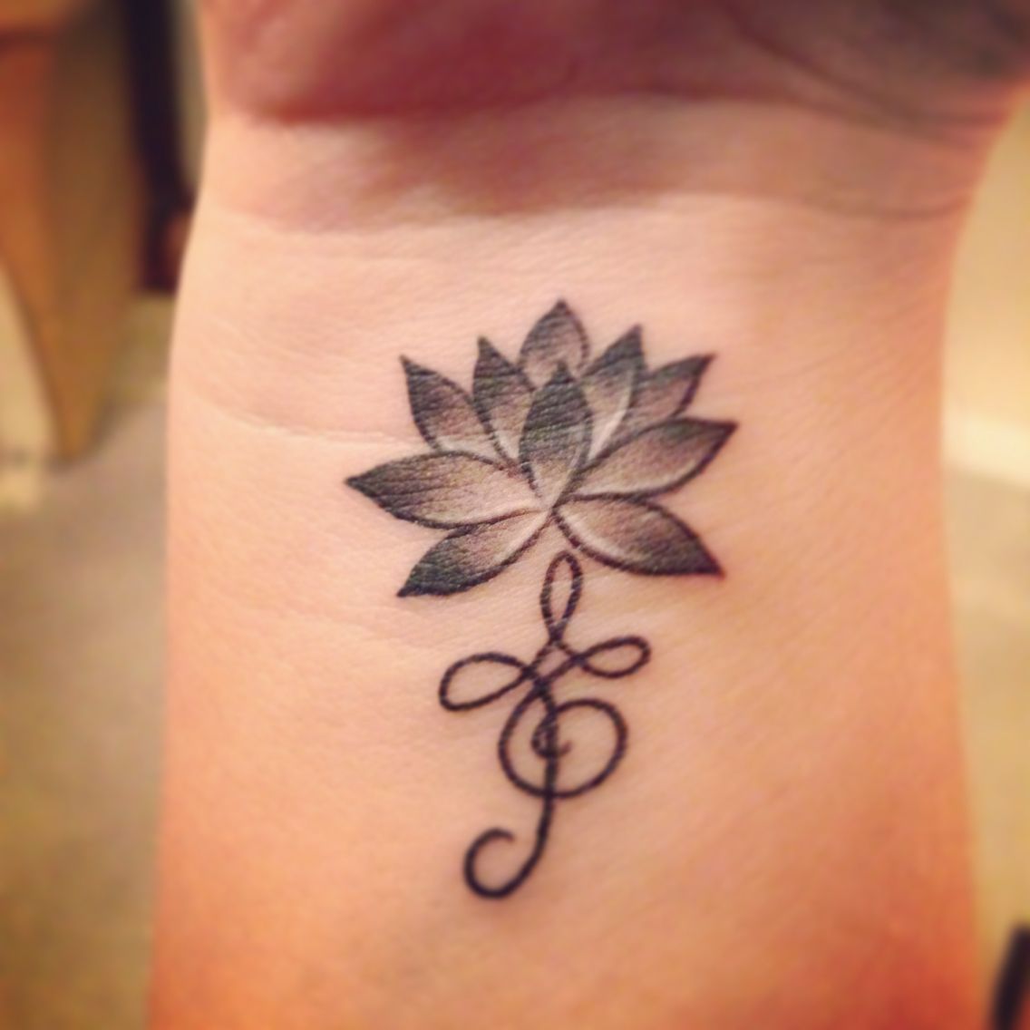 Lotus flower for strength and beauty Zibu symbol meaning embrace life. Marking my niece’s Lily’s 1st Birthday