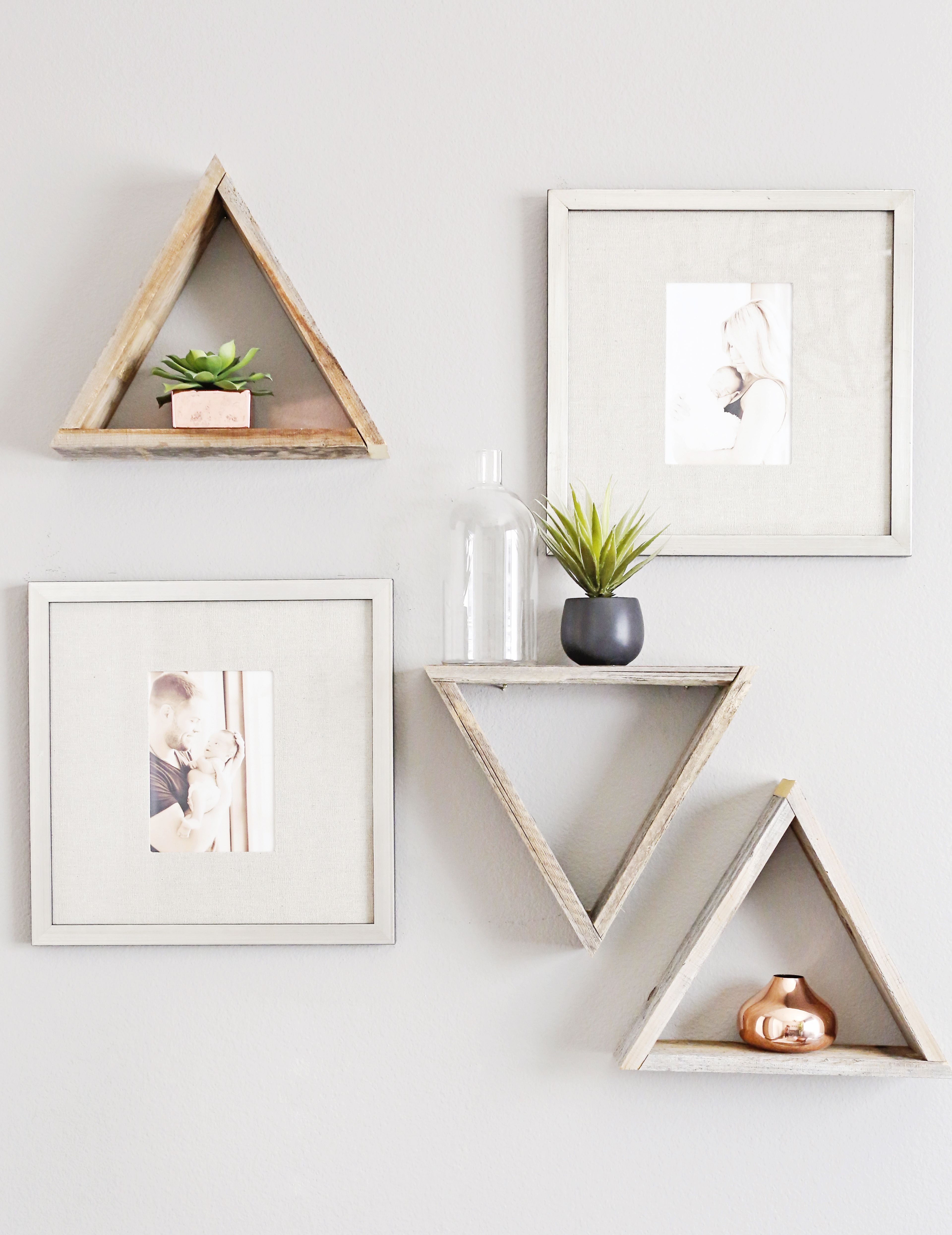Modern triangle nursery wall shelves with trendy rose gold accents.