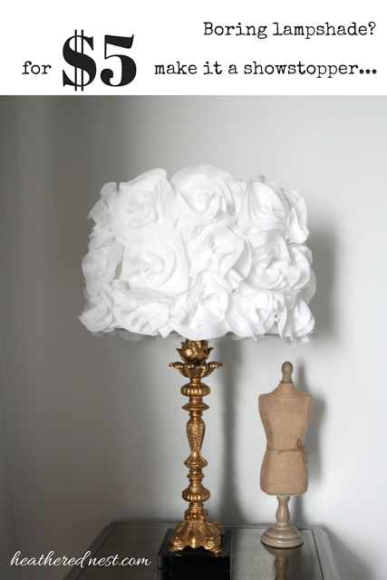 Plain Jane lampshade? Turn it into a stunner with this $5 DIY Fabric Flower Lampshade Tutorial from Heathered Nest!