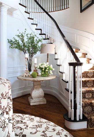 Pretty table but… I love the idea of a banquette in a large entry way!