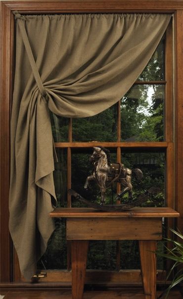 Simple tie back curtain….love it pulled toward the top on one side…..drapes well! Sooo plain and prim!