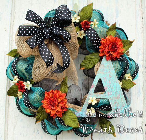 This beauty could stay up on your door from Spring – Fall. This wreath measures approximately 24 inches wide and is 8 inches deep.