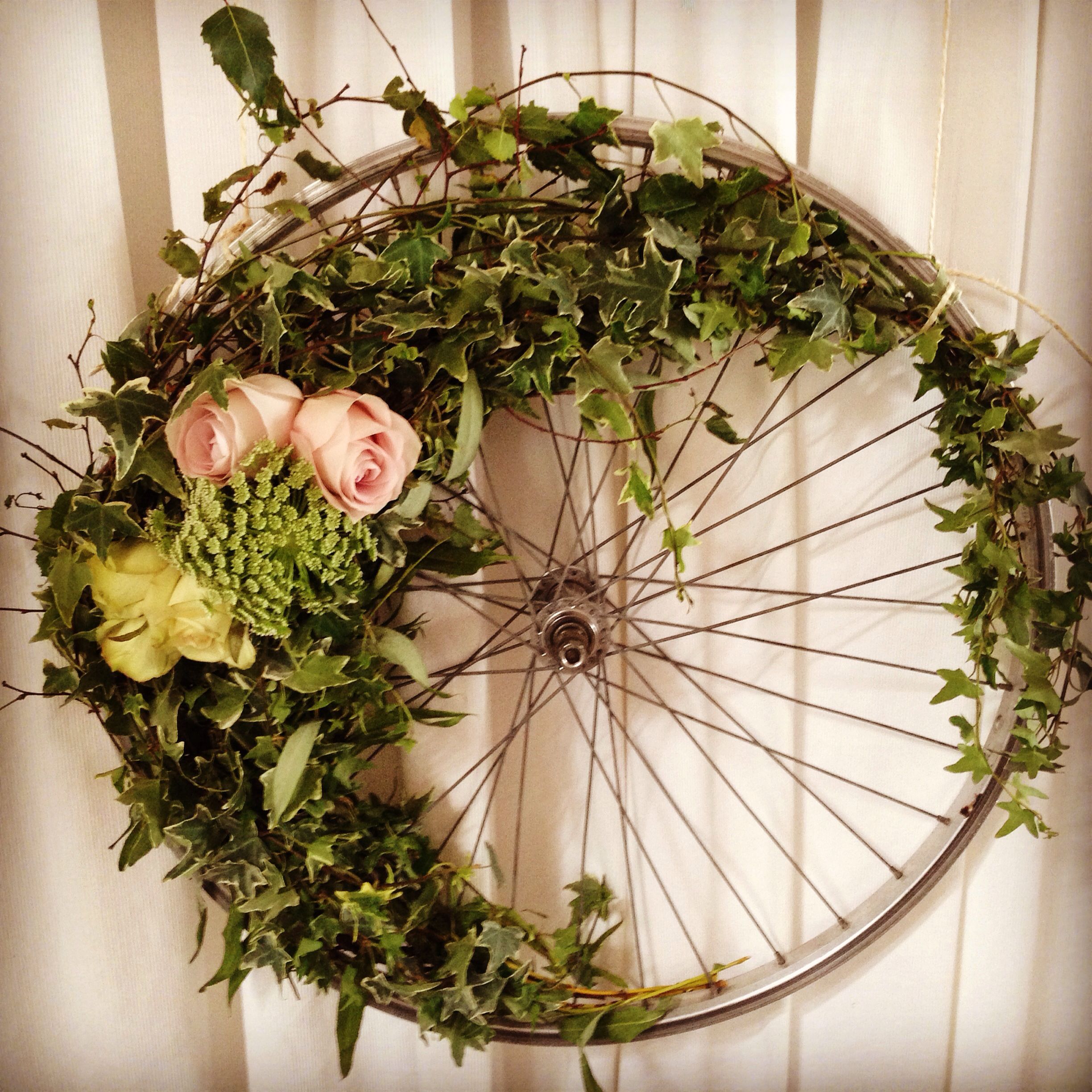 Bike wheel flower wreath