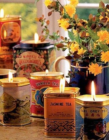 candles in tea tins… I think this is much prettier than the tea tin herb pins floating around – and I can much more easily burn