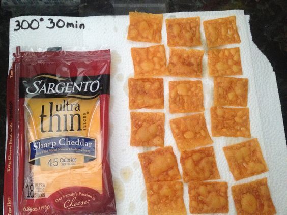 Cheez-Its These, to me, taste just like Cheez-Its.  Cut each Ultra Thin Sargento Sharp Cheddar Cheese slice into quarters, place