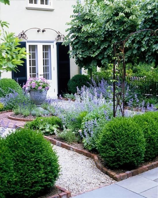 FRONT Courtyard w/fountain vs urn, surrounded by French Lavender, NO boxwoods