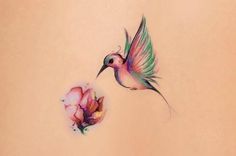 hummingbird and a flower tattoo