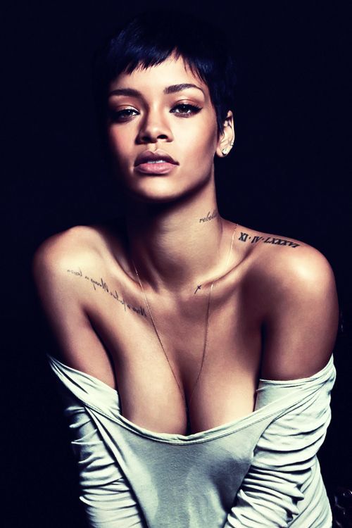 I think rihanna recognizes the most beautiful part of a women is their neck and collarbone and her tattoo’s compliment hers