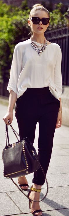 Like the sleeve length of this blouse. Neckline would not work nor color of blouse. I also like the chic black office appropriate