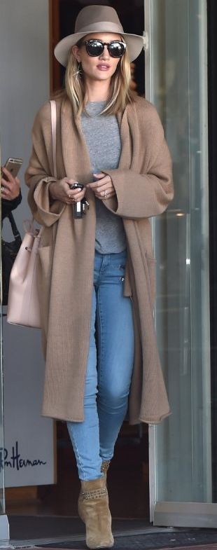 Rosie Huntington-Whiteley layers the Babaton Thackeray sweater over her LA attire.