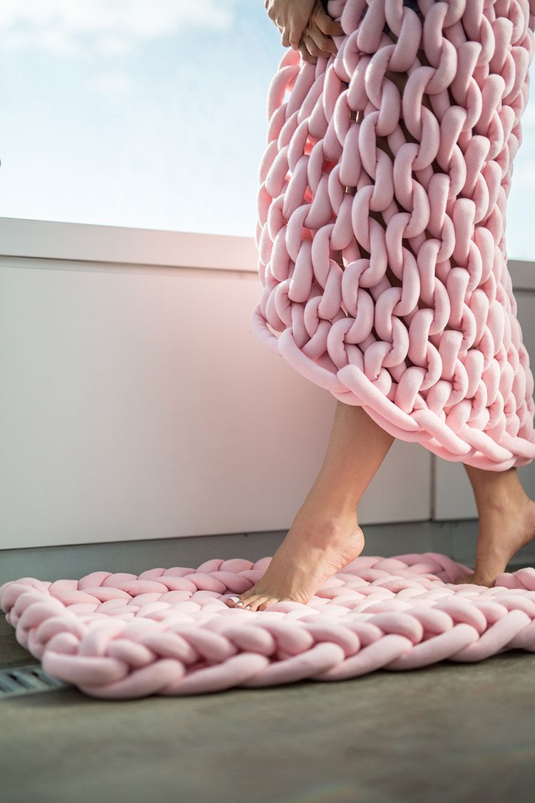 Super-chunky knit blankets would require gigantic knitting needles, but this designer has found a way to forego the needles