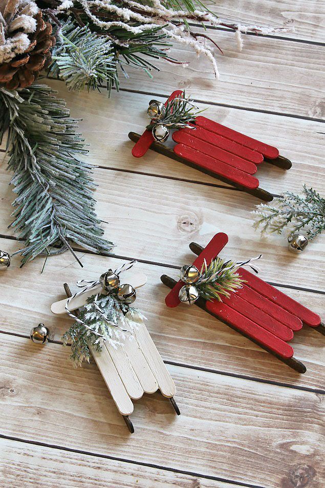 These popsicle stick sled Christmas ornaments are an easy DIY project that even the kids can do and add a simple, rustic touch to