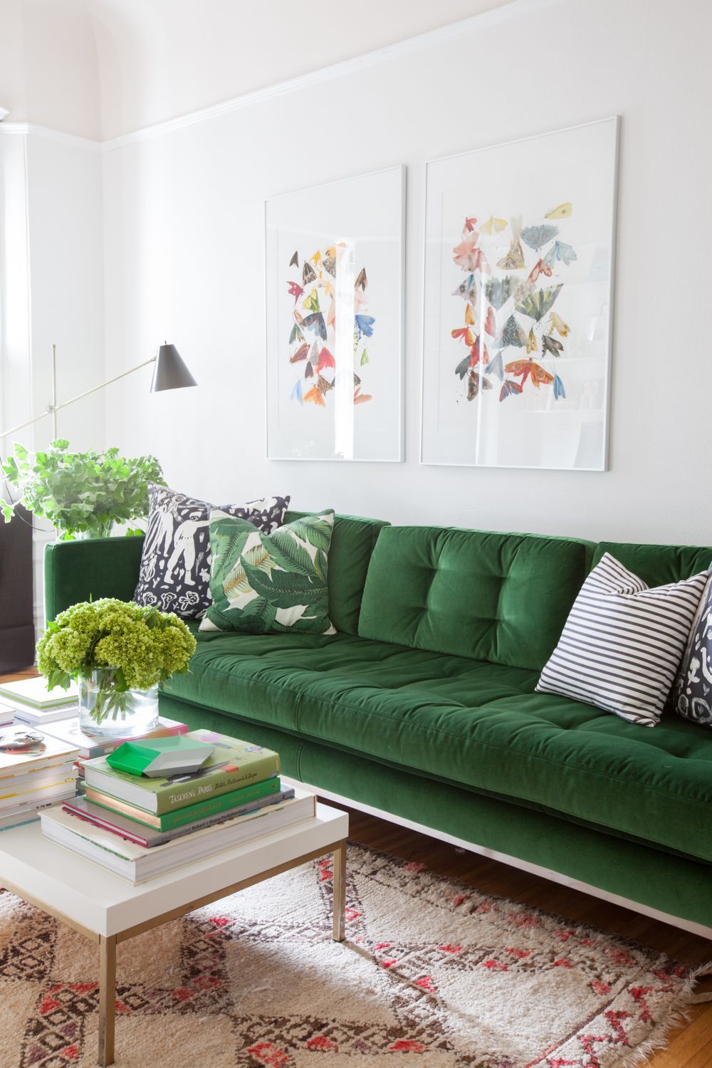 velvet, emerald-hued Sabine sofa is the perfect anchor for this San Francisco home.