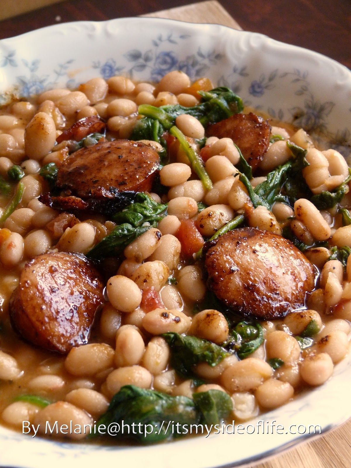 White Beans with Spinach & Sausage… this looks yummy and good for you too.