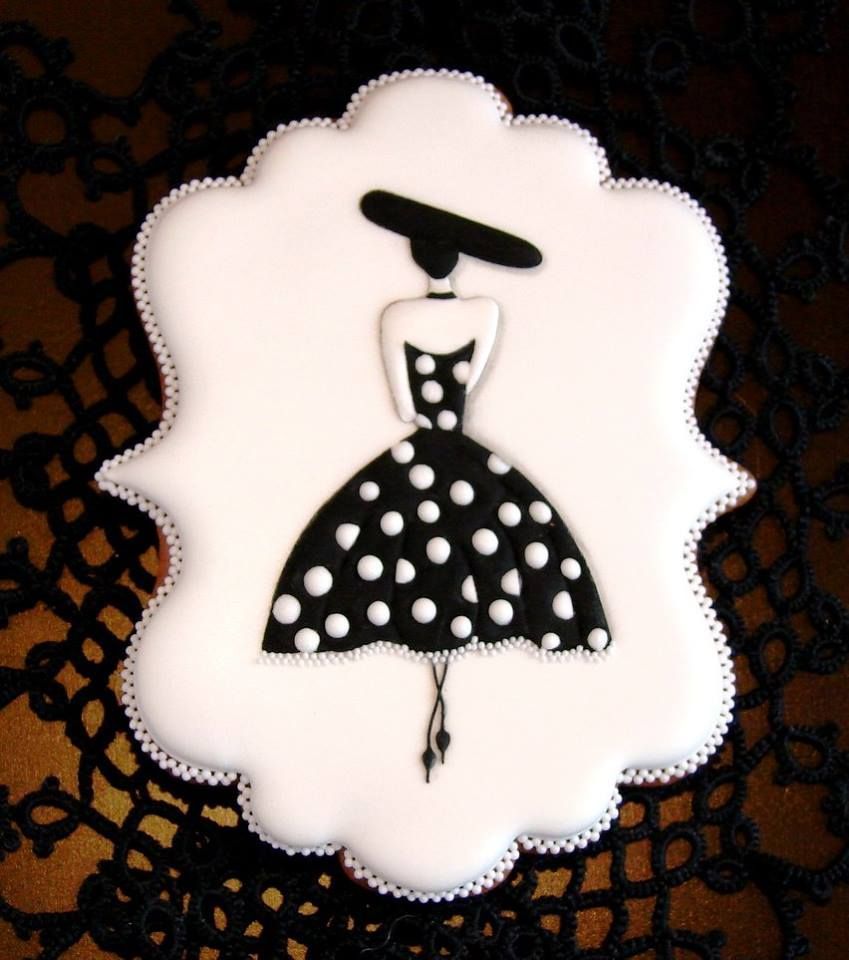 Black and white polka dot dress , hat decorated cookies