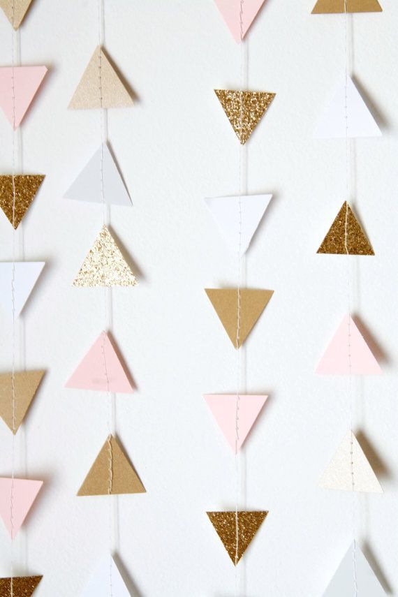 Blush pink, white and shimmery gold paper triangle garland – SO fun for a variety of events!  Baby Shower Gender Reveal Birthday