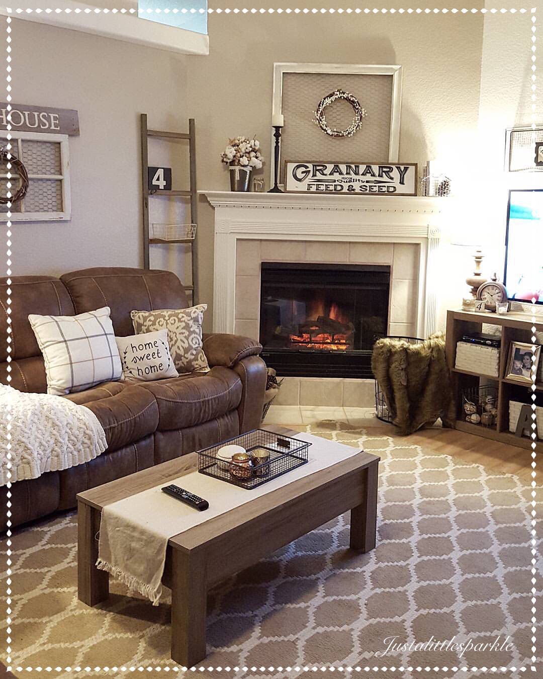 Cozy living room, brown couch decor, ladder, winter decor