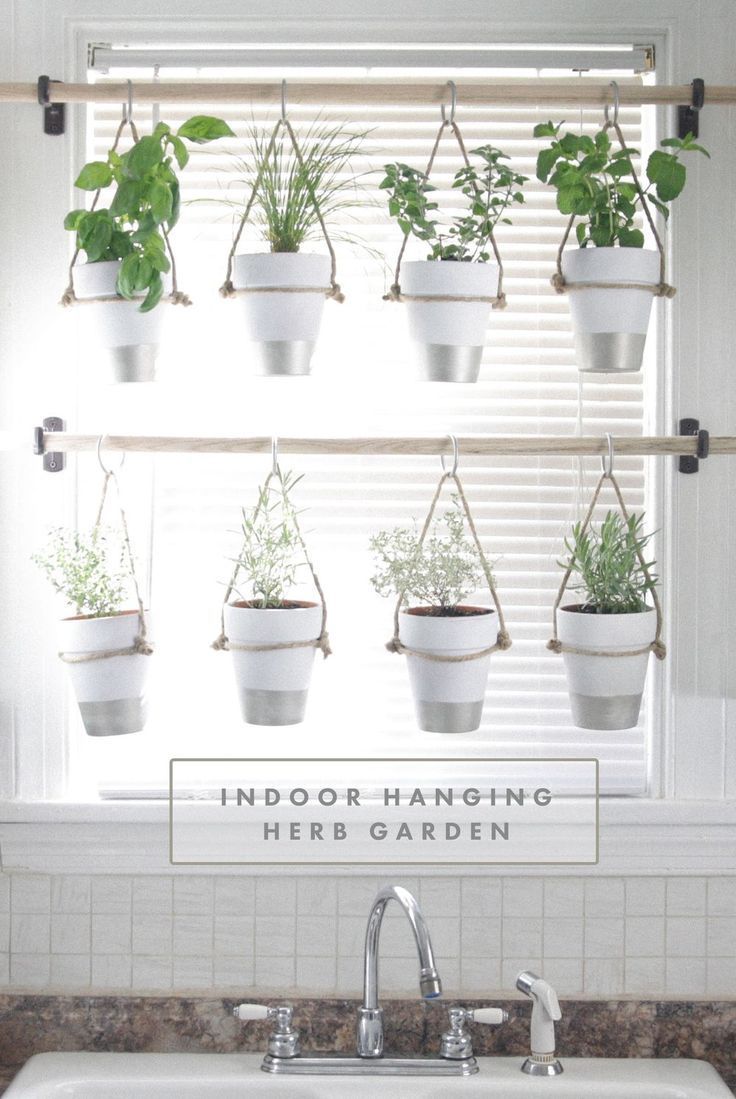 DIY Indoor Hanging Herb Garden // Learn how to make an easy,  budget-friendly hanging herb garden for your window. It will make