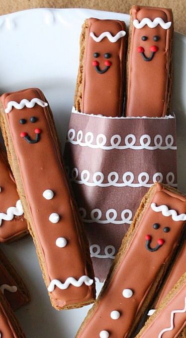 Gingerbread Men Cookie Sticks. Also link to monster and snowman cookie sticks. Too cute and you don’t need a bunch of messy cookie