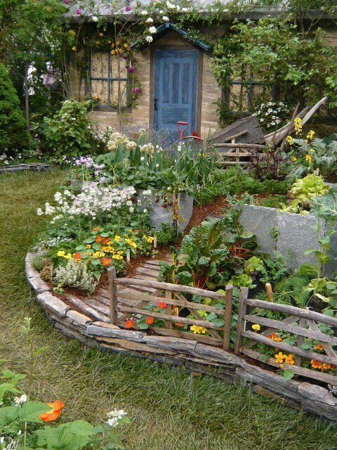 I love the stone boarder. Would love something like this bordering our plant beds in front of the front porch