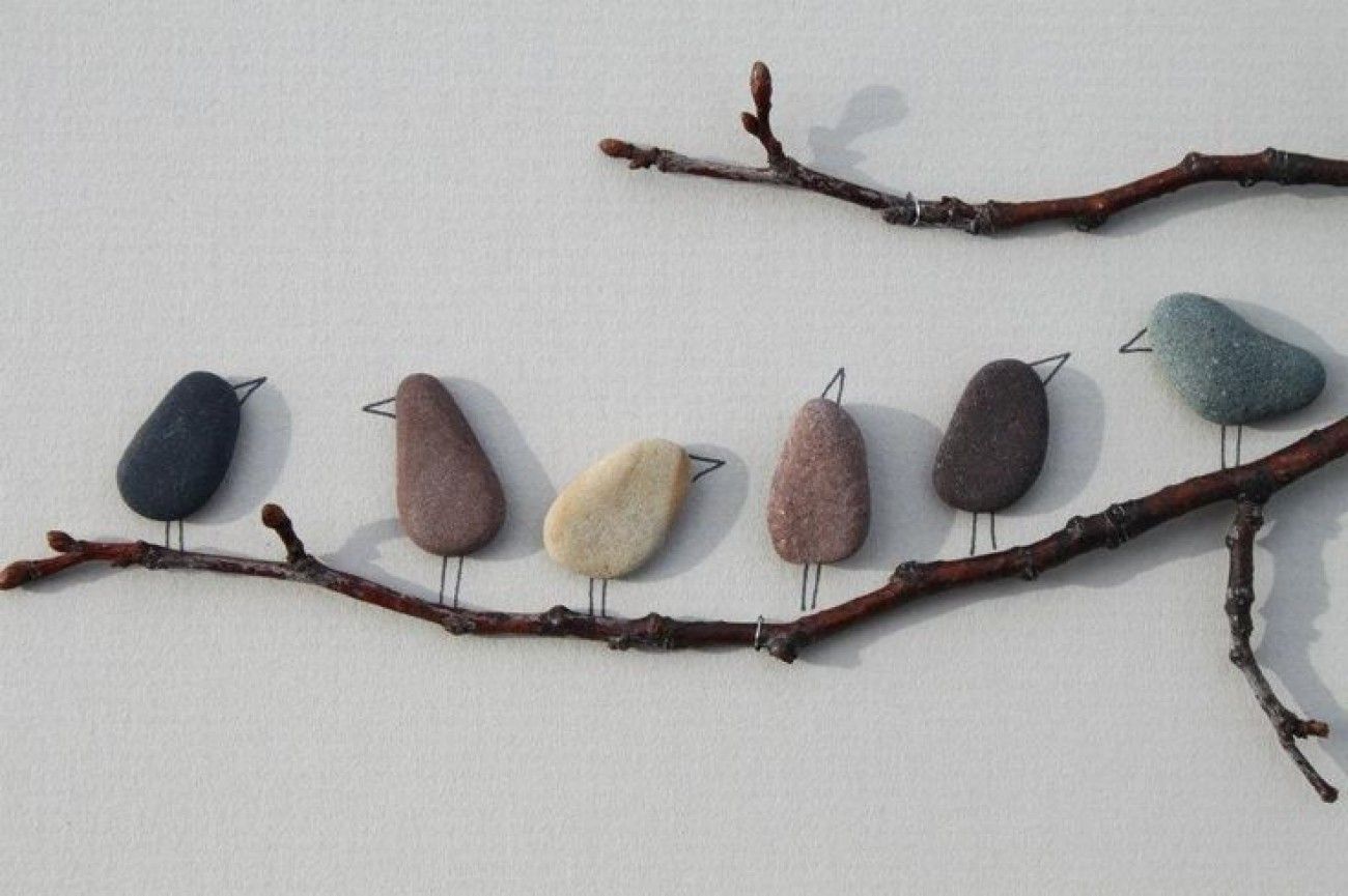 I love these adorable birds on a branch made from smooth stones or pebbles. Such a fun piece of garden art or a fun nature