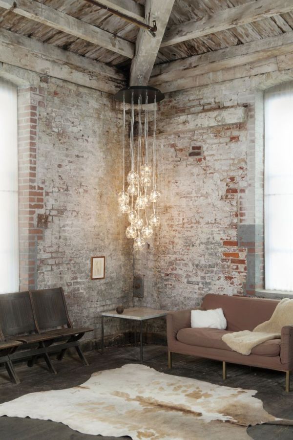 Isn’t this awesome. Blend of fragil glass bulbs and hard tough bricks.  Nice!  From sit “How to Achieve an Industrial Style”