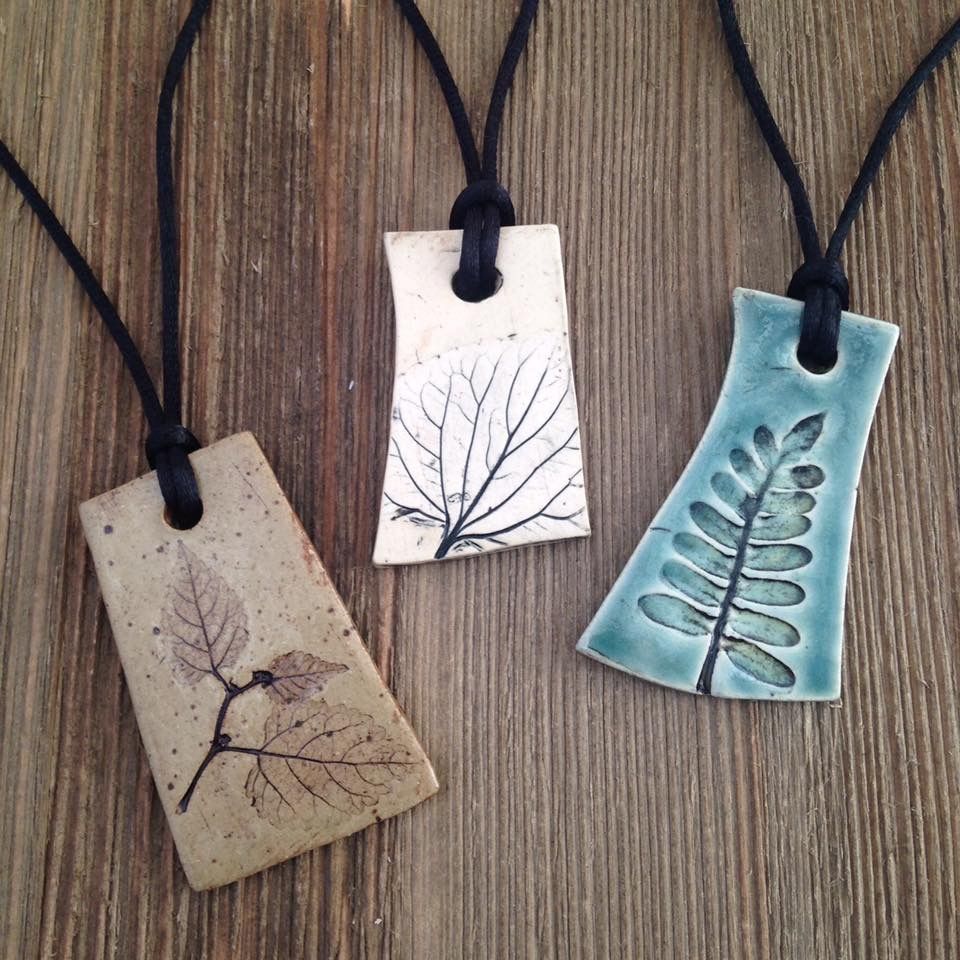 Love these nature pottery necklaces