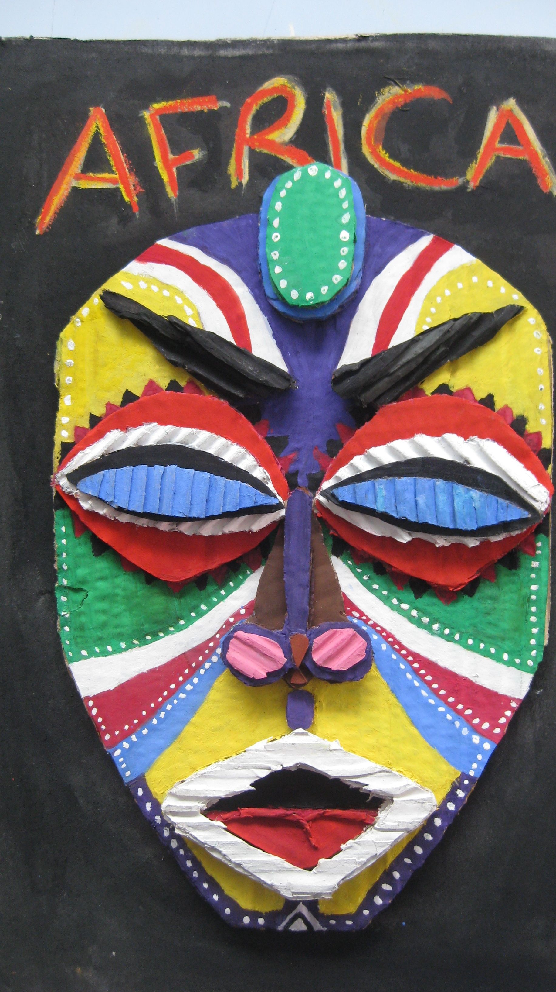 Lovely cardboard mask made from layering of cardboards for theme Africa