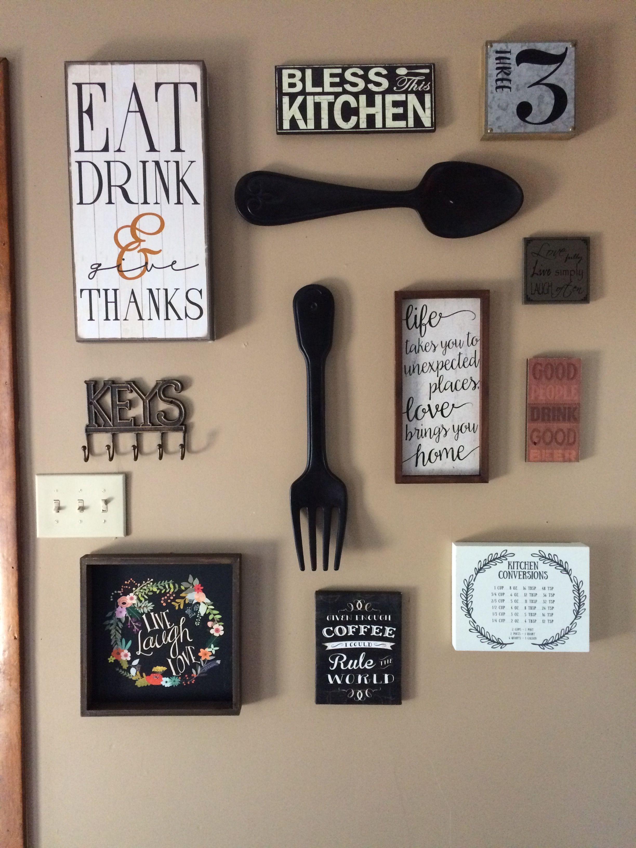 My kitchen gallery wall. All decor from hobby lobby and Ross. Completed the project in 1 hour.  It turned out amazing.