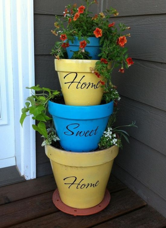 painted flower pots | Crafts / Stacked Flower Pots. Spray painted terra cotta pots to give …