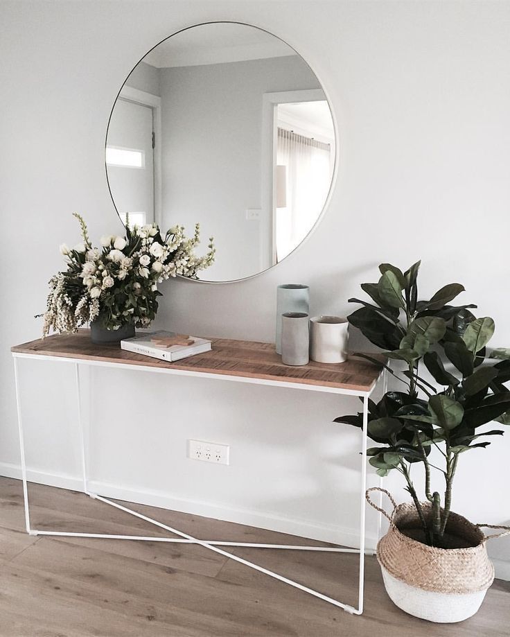 Perfect sideboard, round mirror and plants for the hallway! I need!