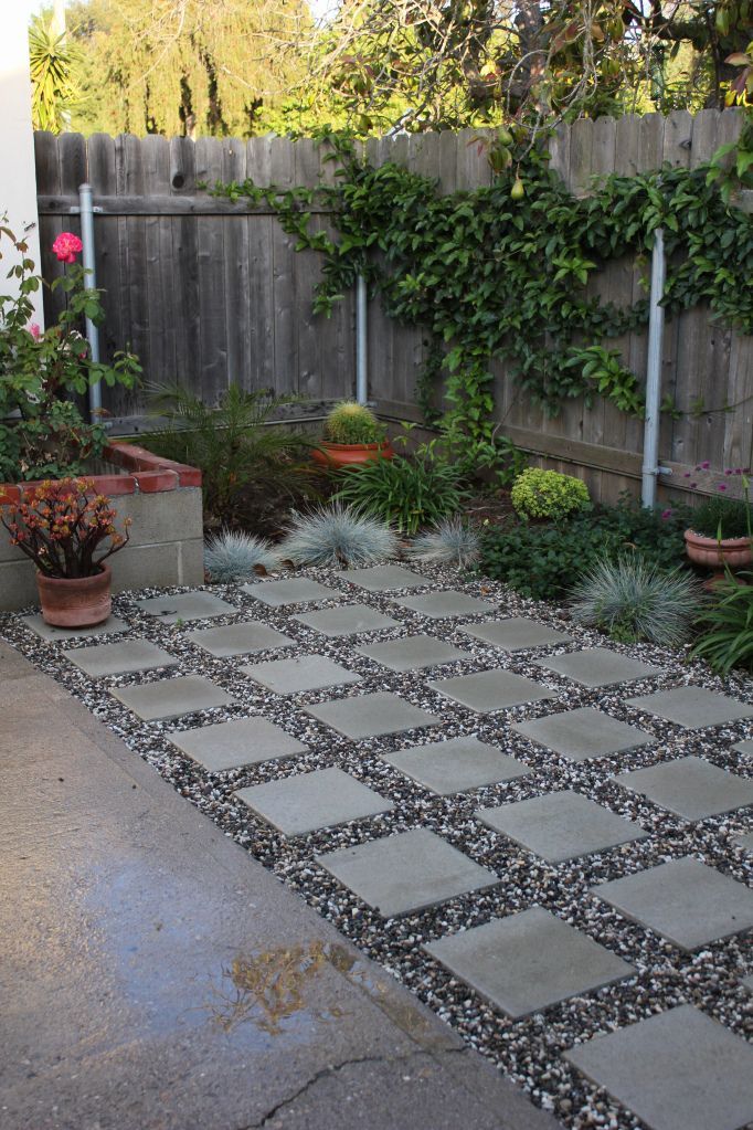 SIMPLE SQUARE PAVERS AND GRAVEL (side yards)