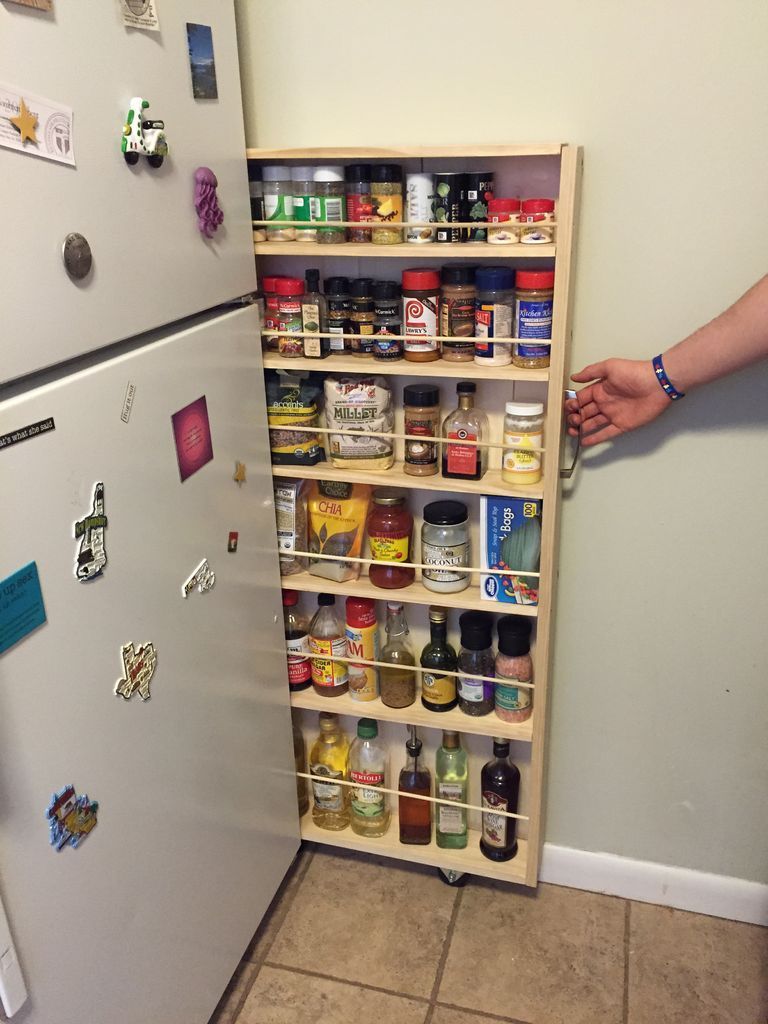 Space Saving Spice Rack with wheels. Maybe you could put it someplace other than next to the fridge. Like in between shelving!