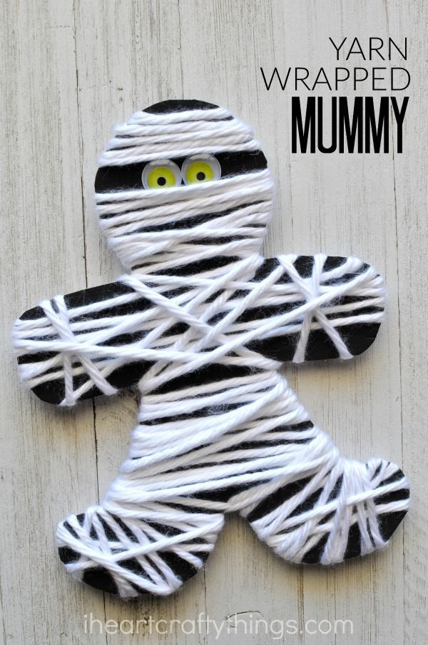 This yarn wrapped mummy craft is perfect for little ones for a fine motor activity. It makes a great Halloween kids craft too.