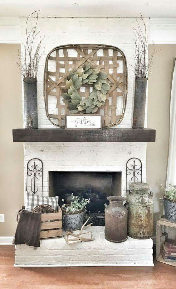 Tobacco basket over fireplace with wreath.