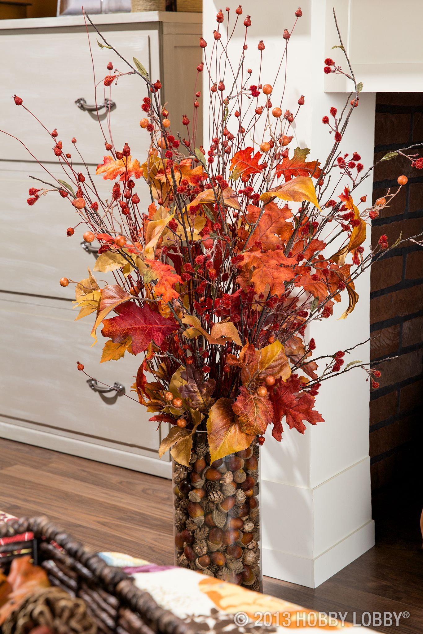 Use faux-floral stems for a flower arrangement that will last all the way through the chilly days of Fall and Winter and straight