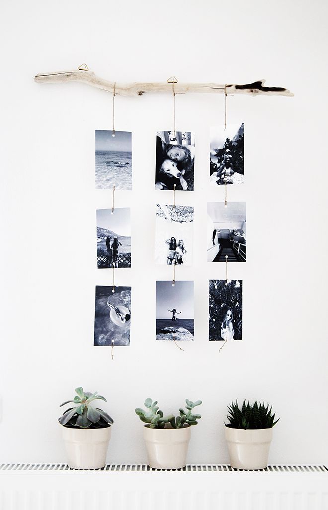 @beyjess12 // I love this idea of hanging pictures on strings from a piece of driftwood!