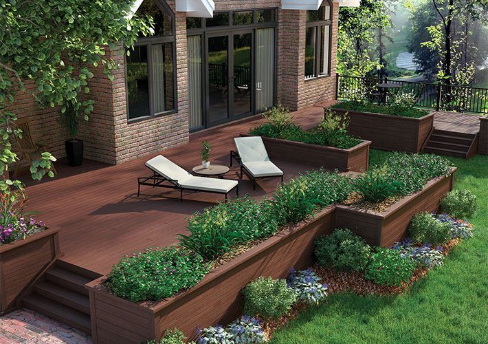 composite deck with low flower beds instead of railing